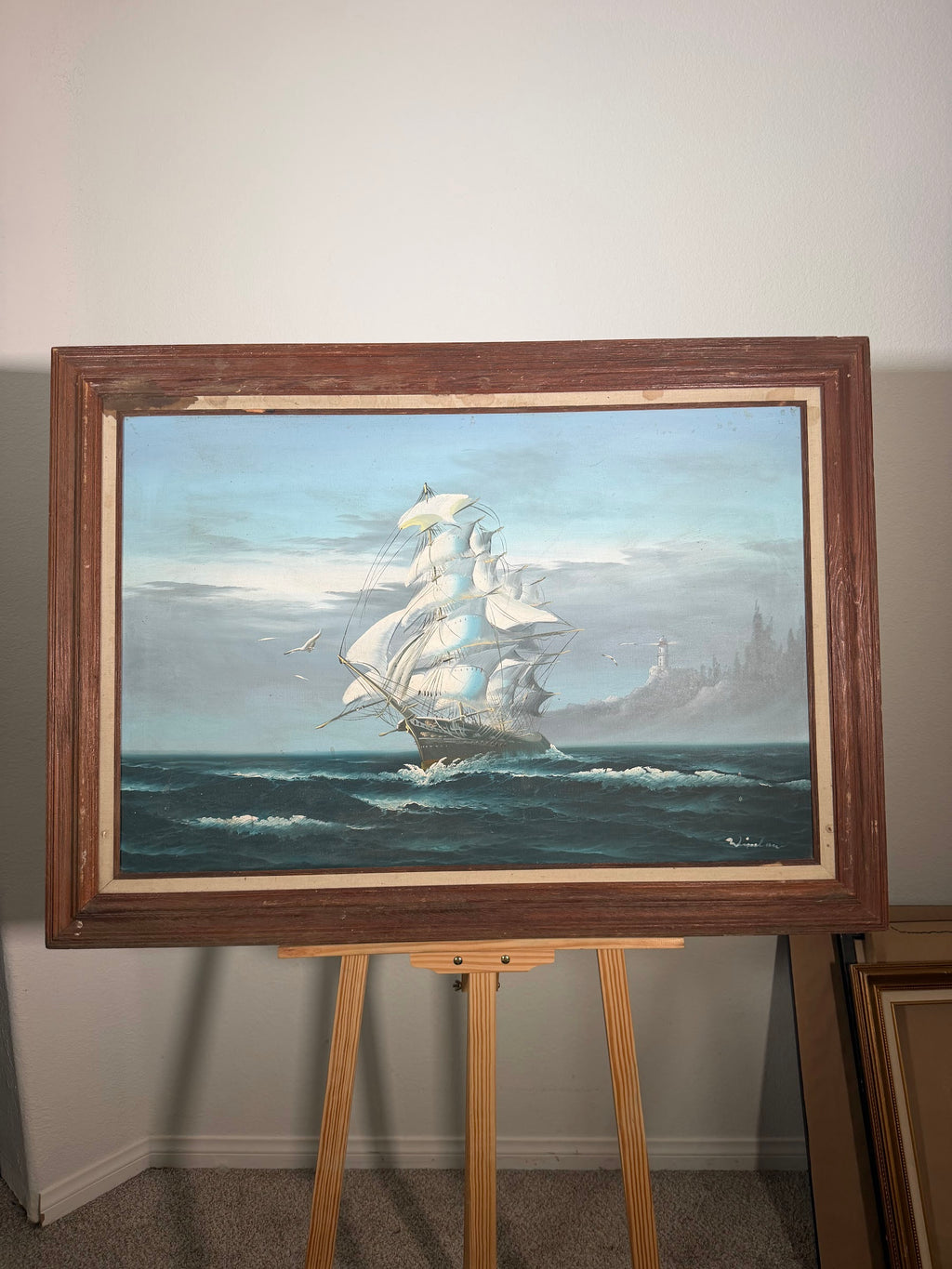 Lot 1018: Large Clipper Ship Oil Painting, Full Sail on Rolling Seas with Lighthouse, Signed, Wood Frame, 43 x 31 in