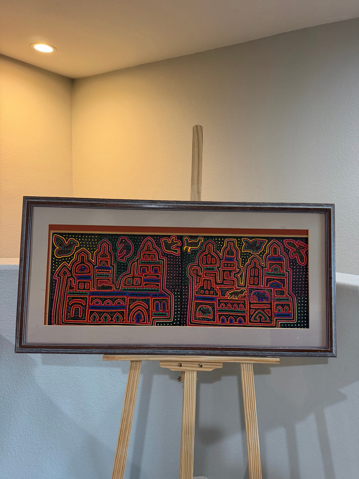 Lot 1019: Pair of Kuna Mola Textile Panels, Hand Stitched Reverse Applique, Cathedrals and Birds, Matted and Framed, 38 x 18.5 in