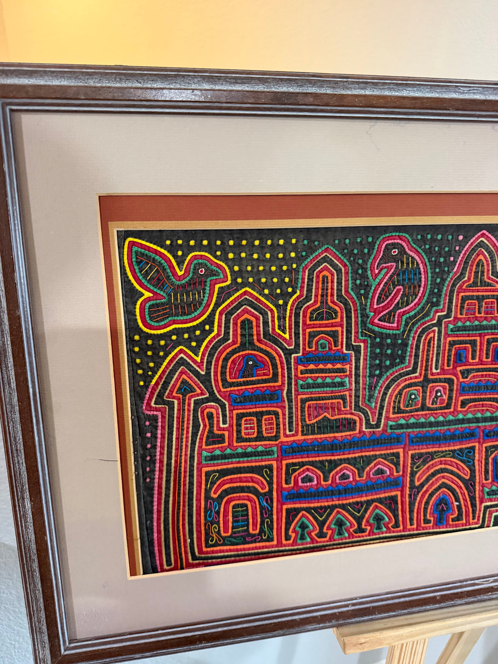 Lot 1019: Pair of Kuna Mola Textile Panels, Hand Stitched Reverse Applique, Cathedrals and Birds, Matted and Framed, 38 x 18.5 in