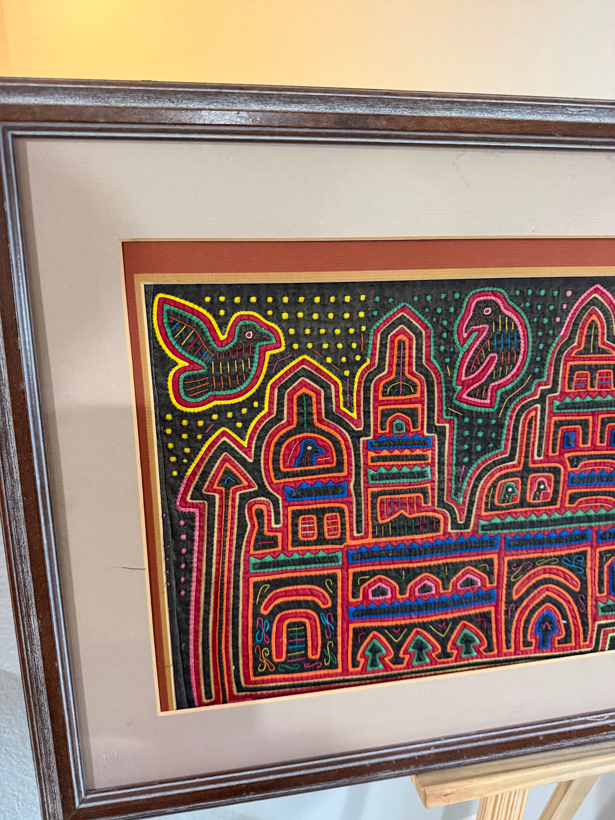 Lot 1019: Pair of Kuna Mola Textile Panels, Hand Stitched Reverse Applique, Cathedrals and Birds, Matted and Framed, 38 x 18.5 in
