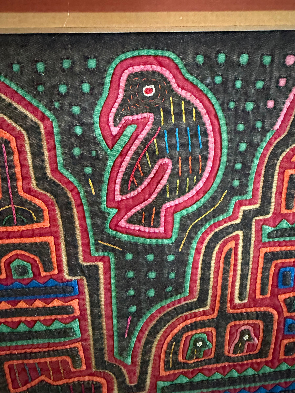 Lot 1019: Pair of Kuna Mola Textile Panels, Hand Stitched Reverse Applique, Cathedrals and Birds, Matted and Framed, 38 x 18.5 in