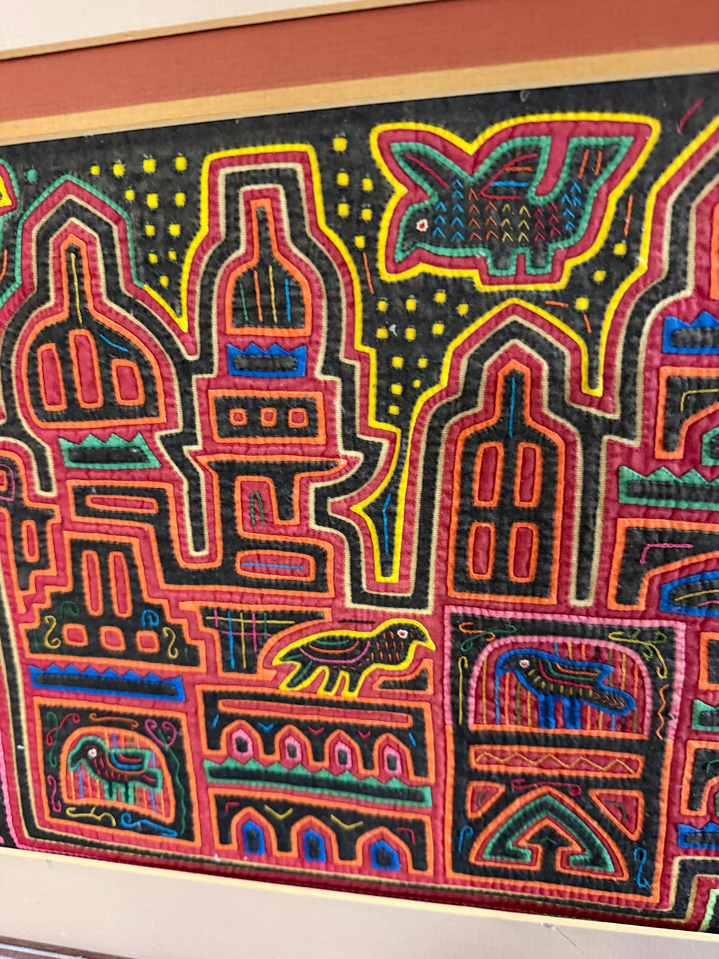 Lot 1019: Pair of Kuna Mola Textile Panels, Hand Stitched Reverse Applique, Cathedrals and Birds, Matted and Framed, 38 x 18.5 in