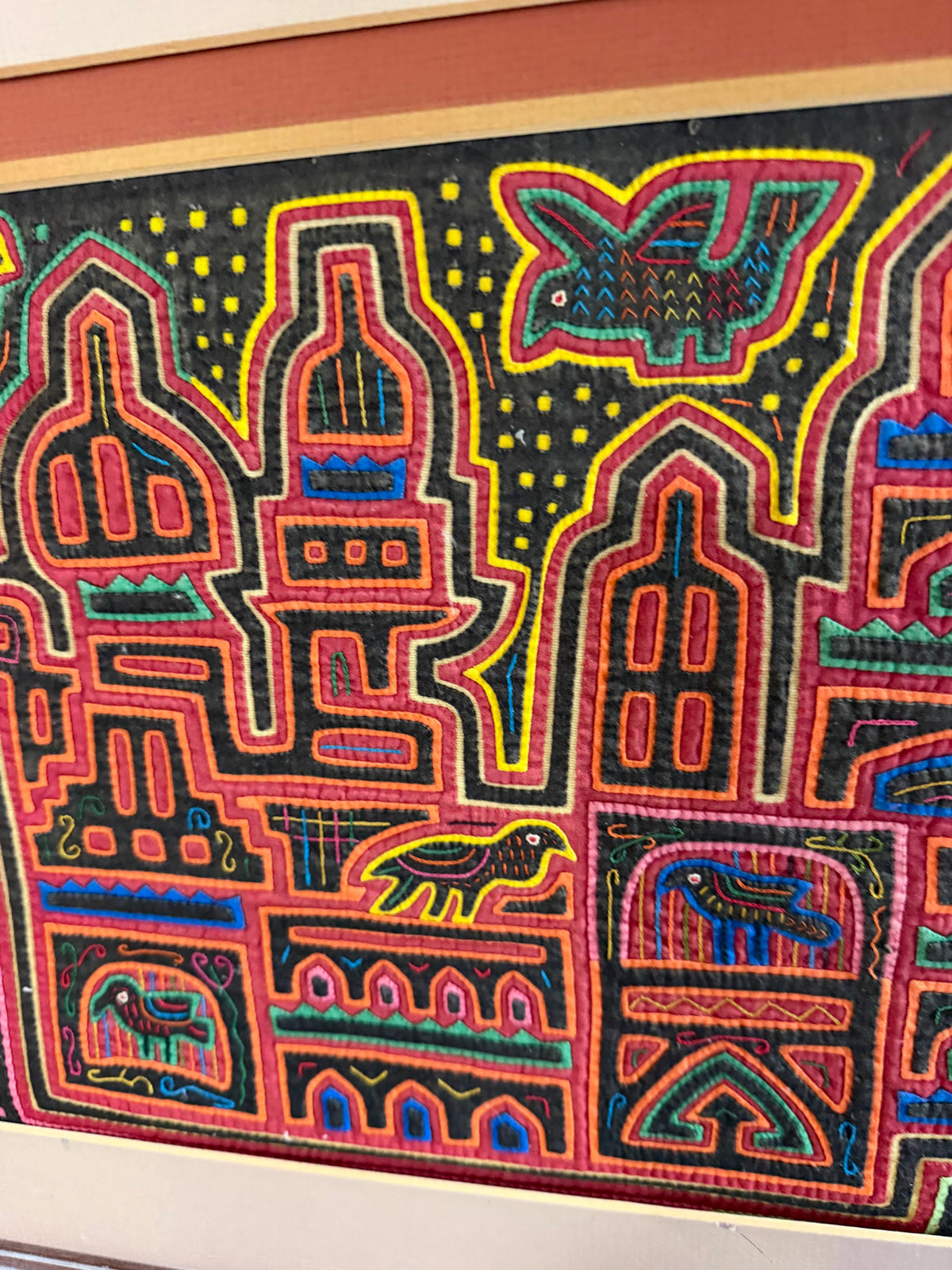 Lot 1019: Pair of Kuna Mola Textile Panels, Hand Stitched Reverse Applique, Cathedrals and Birds, Matted and Framed, 38 x 18.5 in
