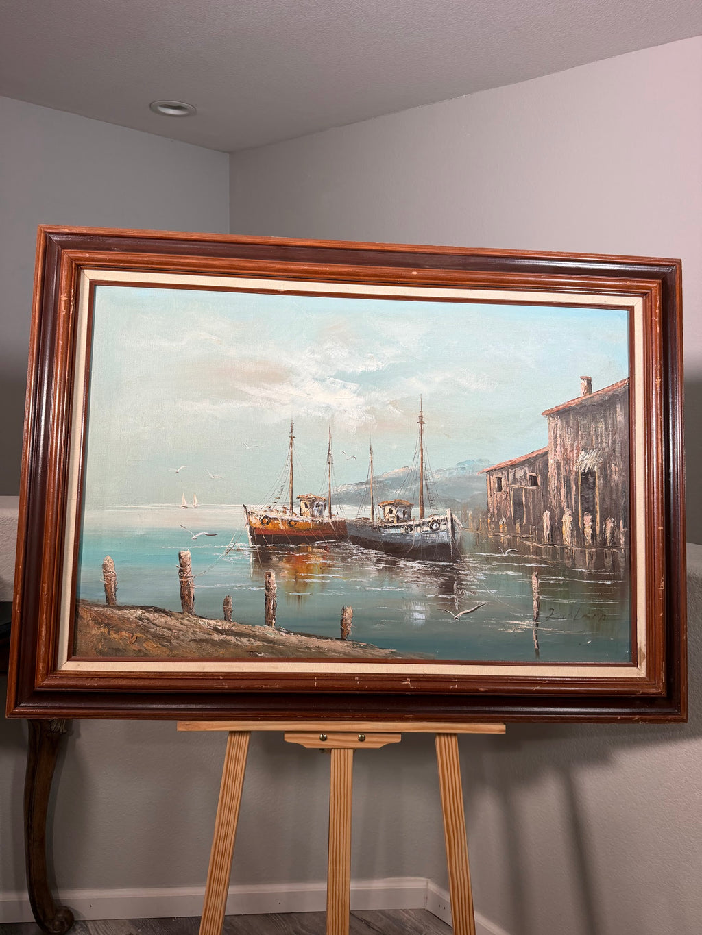 Lot 1025: Harbor Oil Painting, Fishing Boats and Old Waterfront Buildings, Signed Karlson, Walnut Frame with Linen Liner, 43 x 31 in